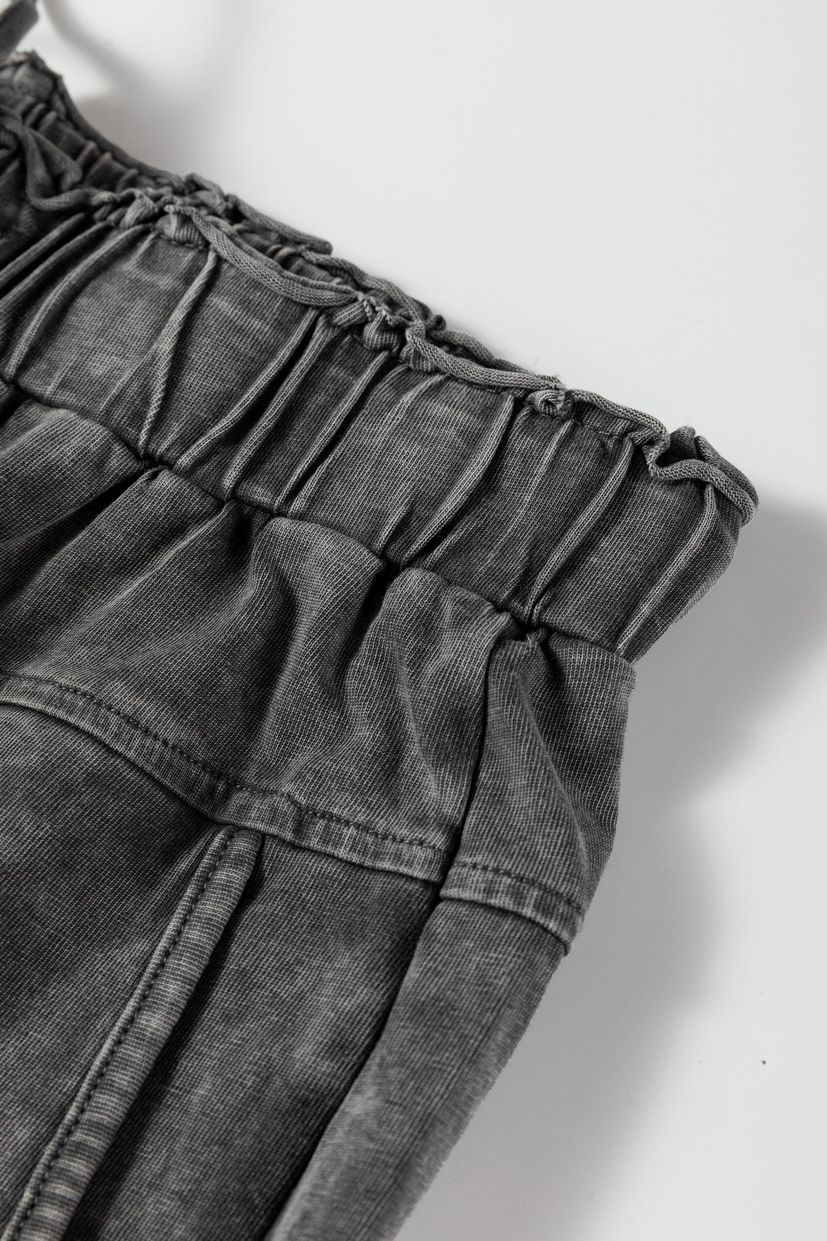 Medium grey high waist lace-up pants with raw hem, patch pockets, and mineral wash, designed by Dear-Lover for a casual look.
