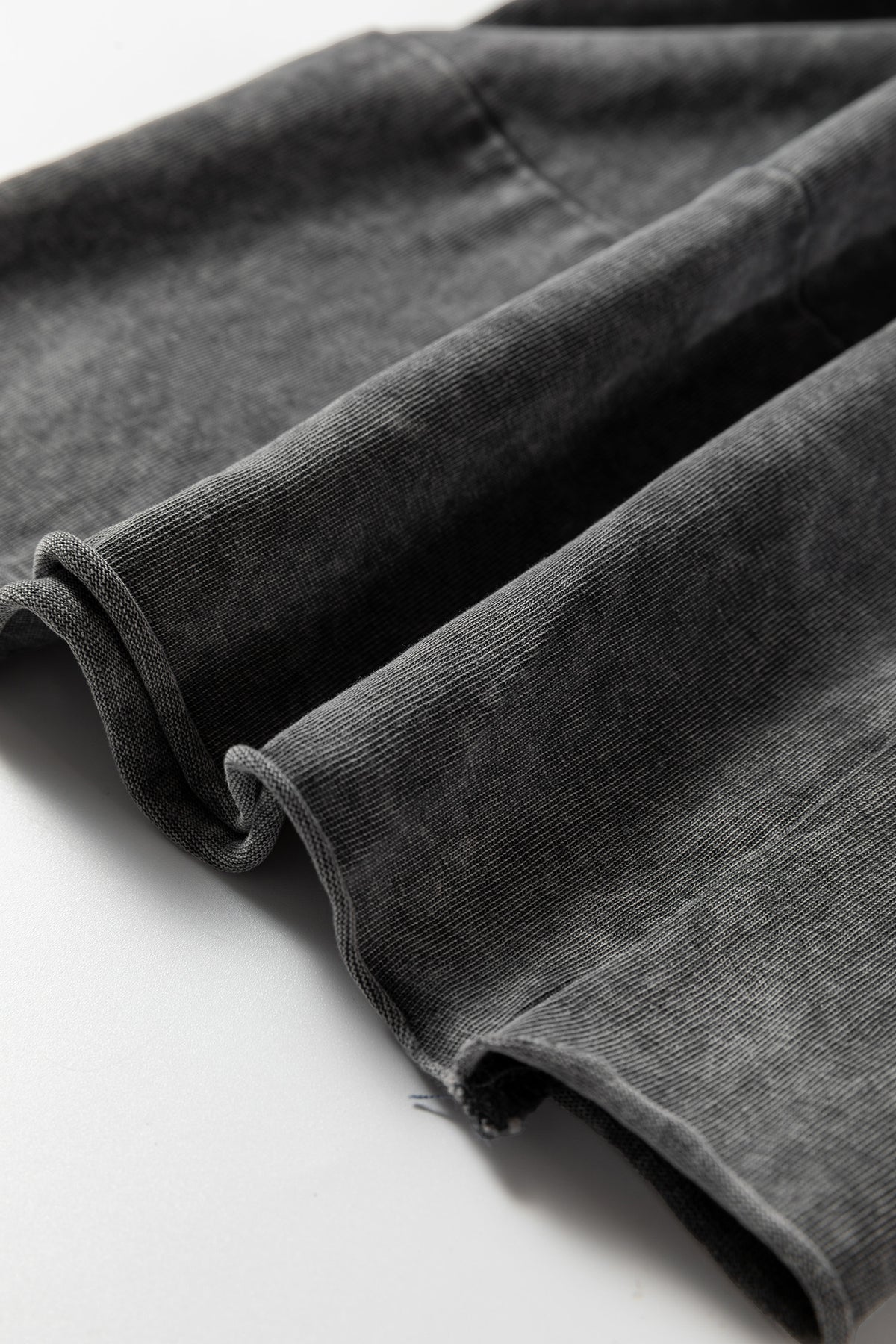 Medium grey Lapis Mineral Wash lace-up high waist pants with raw hem, patched pockets, and a relaxed culotte fit from Dear-Lover.