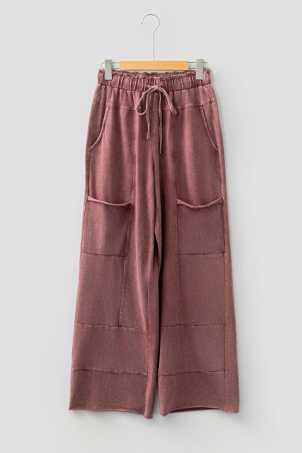Medium grey high-waist lace-up pants with raw hem, patched pockets, and lapis mineral wash from Dear-Lover, casual bottoms.