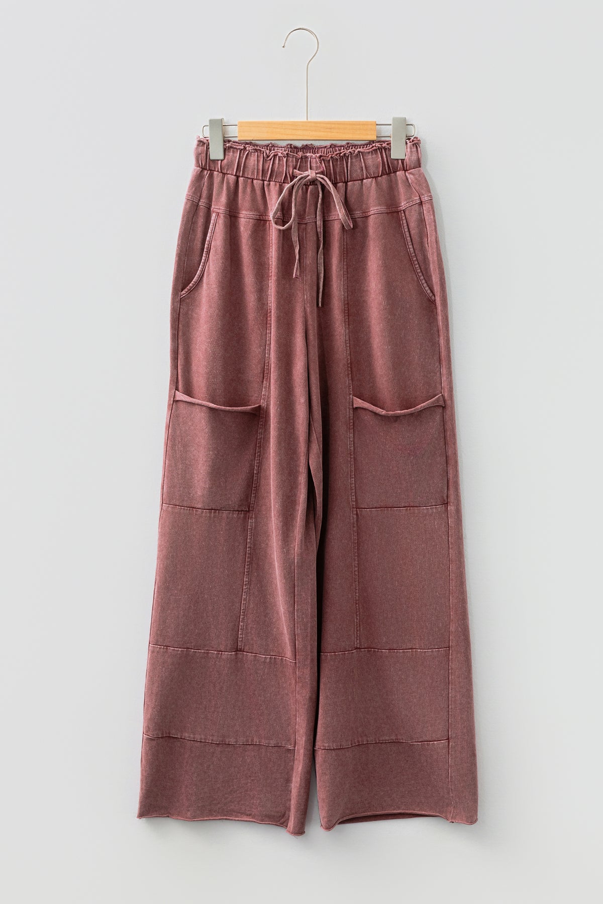 Medium grey high-waist lace-up pants with raw hem, patched pockets, and lapis mineral wash from Dear-Lover, casual bottoms.