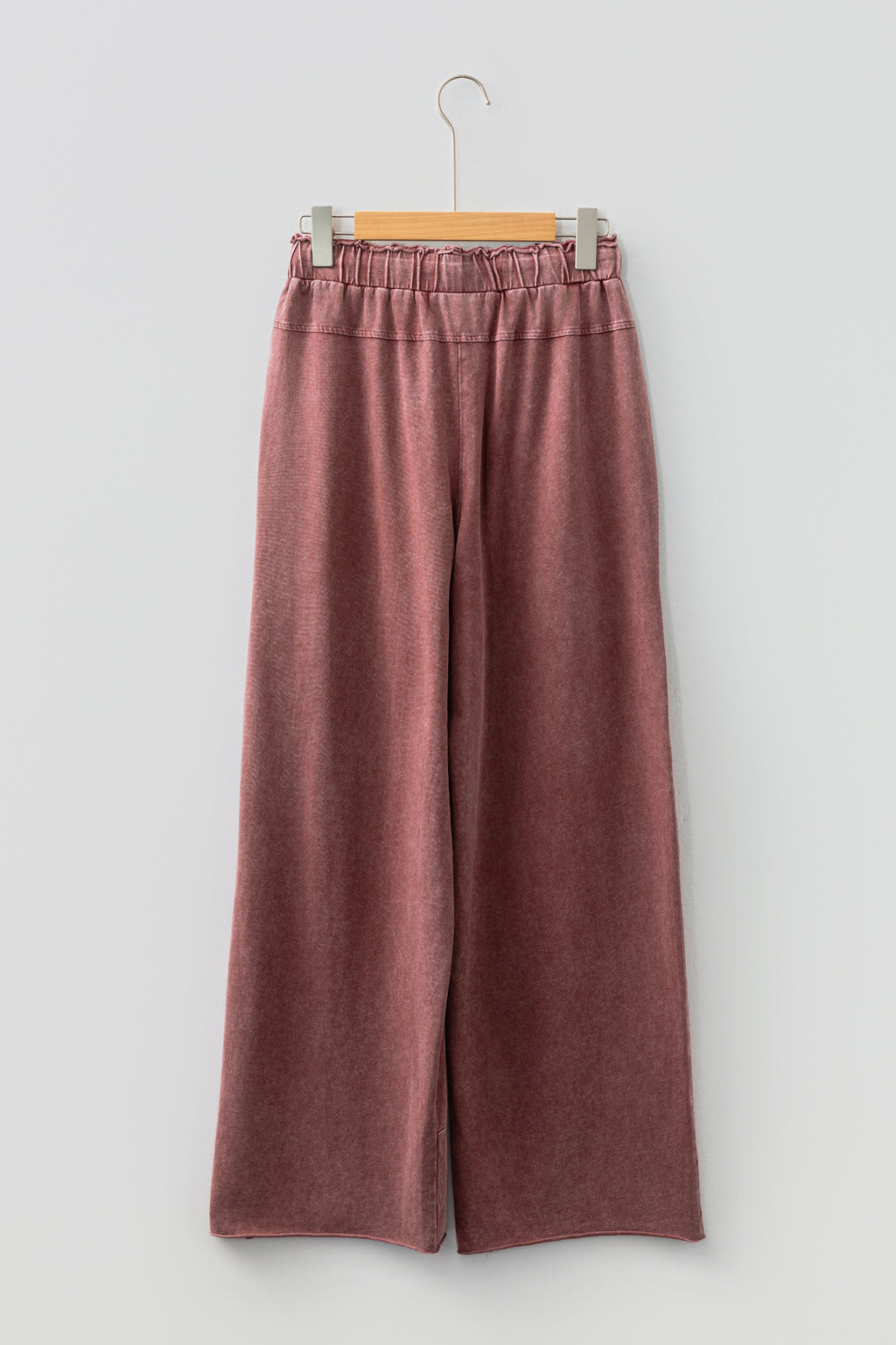 Medium grey lace-up high waist pants with raw hem, patched pockets, and lapis mineral wash, from Dear-Lover Dropshipping.