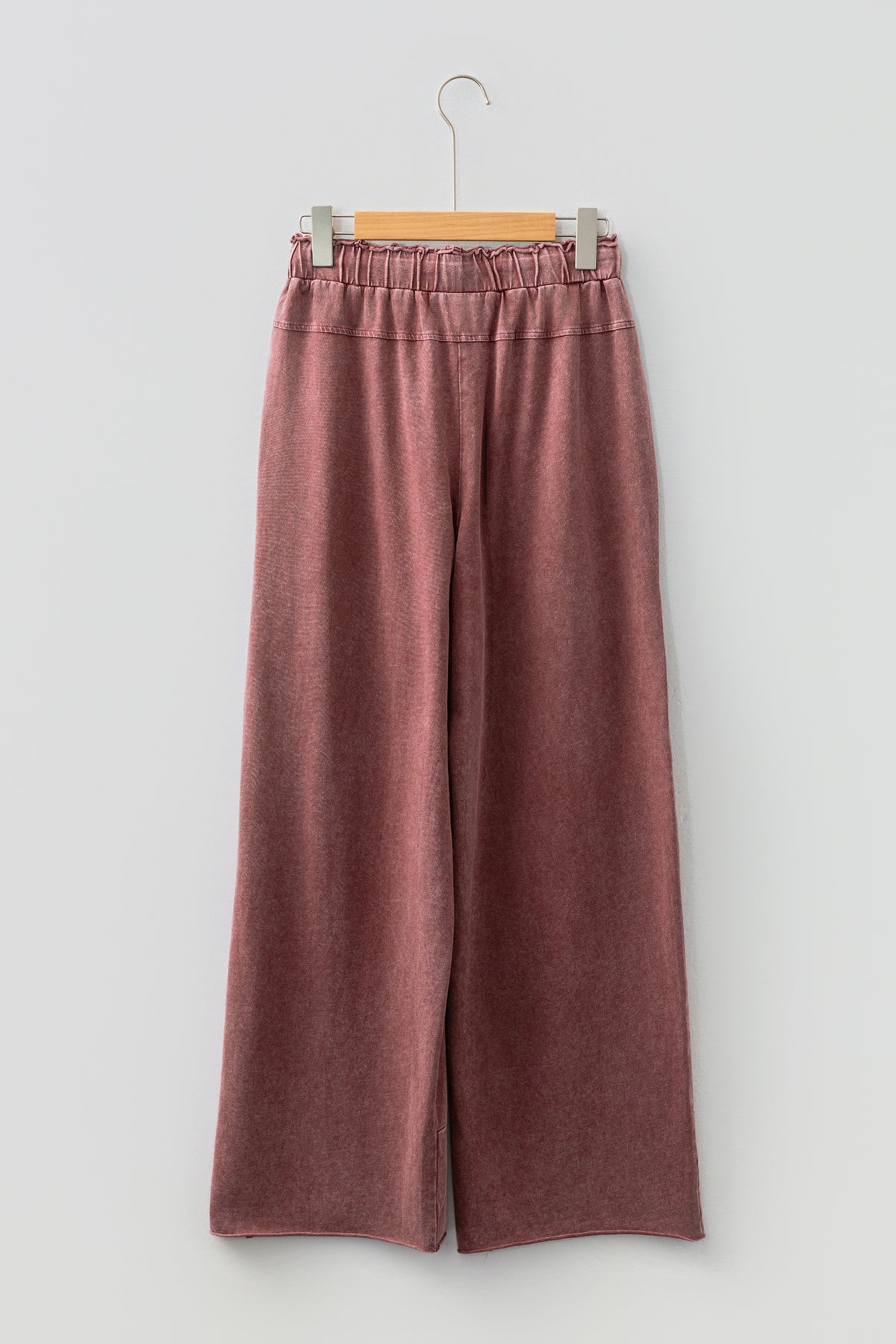 Medium grey lace-up high waist pants with raw hem, patched pockets, and lapis mineral wash, from Dear-Lover Dropshipping.