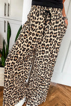 Parchment leopard print flowy wide-leg pants with elastic waistband and drawstring from Dear-Lover, casual bottoms for women.