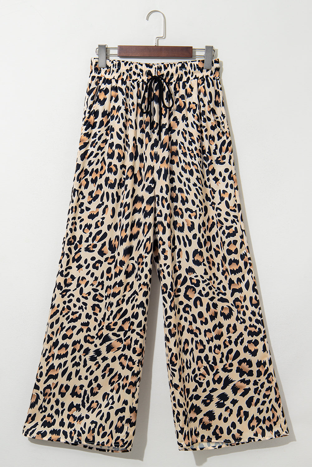 Flowy wide-leg pants with leopard print, drawstring elastic waistband, made of polyester, from Dear-Lover, casual culotte bottoms.