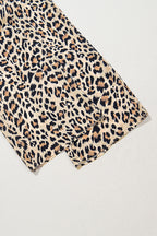 Flowy wide-leg pants with a parchment leopard print, elastic drawstring waistband, made by Dear-Lover, casual culotte style.