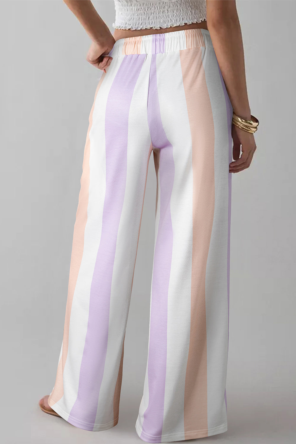 Purple striped multicolored print drawstring loose pants with side pockets, made of polyester and elastane, by Dear-Lover.