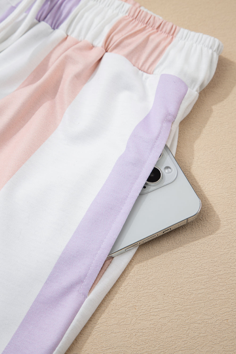 Purple striped multicolored print drawstring loose pants with side pockets, made of polyester and elastane, by Dear-Lover.