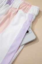 Purple striped multicolored print drawstring loose pants with side pockets, made of polyester and elastane, by Dear-Lover.