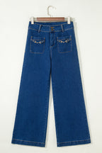 Sail Blue Denim Pants by Dear-Lover with hardware decor, patched pockets, wide-leg fit, cotton-polyester-elastane blend, casual style