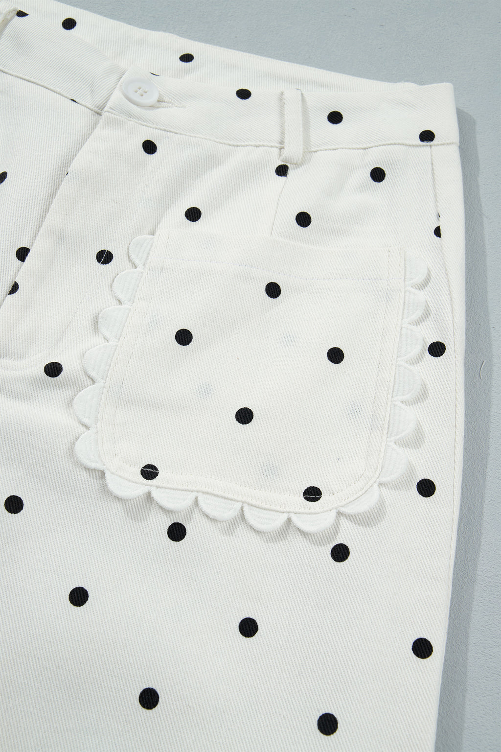 White cotton shift pants with polka dot print, scalloped edges, patch pockets, from Dear-Lover, casual and stylish bottoms.