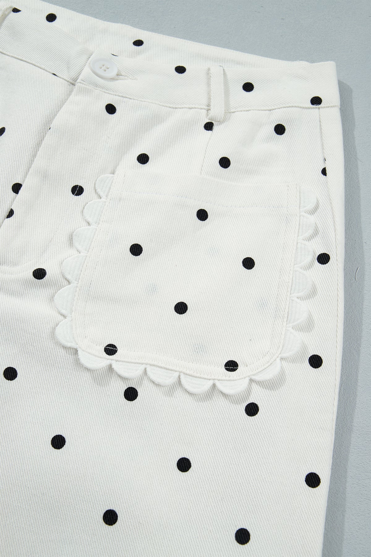 White cotton shift pants with polka dot print, scalloped edges, patch pockets, from Dear-Lover, casual and stylish bottoms.