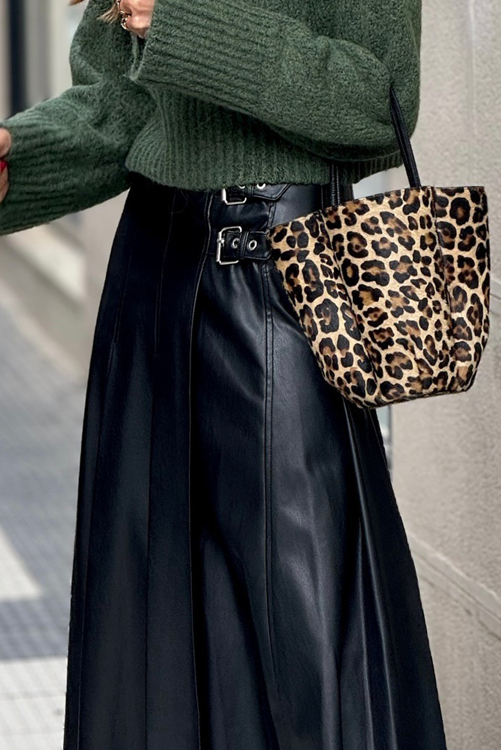 Black faux leather retro buckle detail pleated flared midi skirt by Dear-Lover, featuring stitch accents and a stylish vintage design.