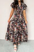 Black floral print V-neck pleated tiered maxi dress by Dear-Lover, featuring cotton-viscose fabric and elegant floral design.