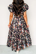 Black floral print V-neck pleated tiered maxi dress by Dear-Lover, with flowing fabric and elegant floral design.