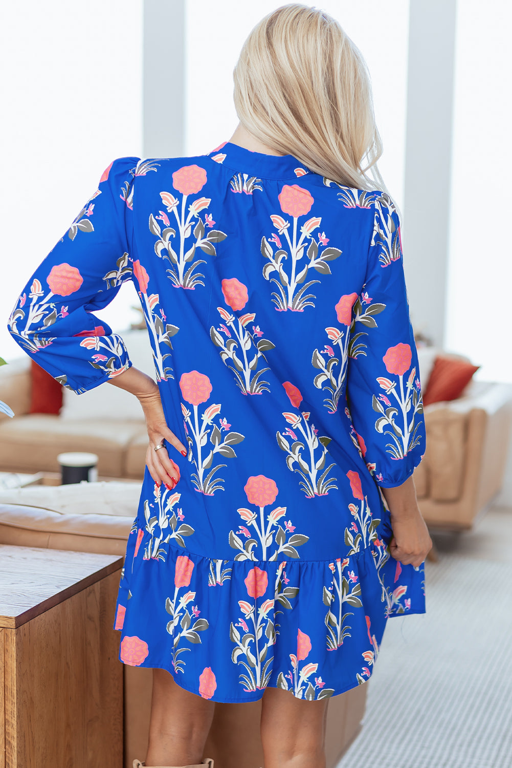 Blue floral print dress by Dear-Lover with button details, 3/4 puff sleeves, and ruffle hem, perfect for casual or summer wear.