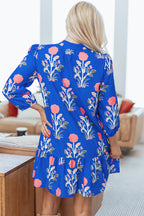 Blue floral print dress by Dear-Lover with button details, 3/4 puff sleeves, and ruffle hem, perfect for casual or summer wear.