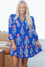 Blue floral print dress by Dear-Lover with button details, 3/4 puff sleeves, and ruffle hem, perfect for casual or semi-formal wear.