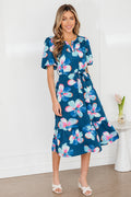 Blue floral print long dress by Dear-Lover with short puff sleeves, ruffle hem, and belt, made of lightweight polyester fabric.