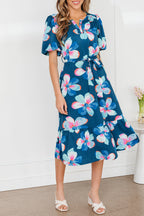 Blue floral print long dress by Dear-Lover with short puff sleeves, ruffle hem, and belt, made from lightweight polyester fabric.