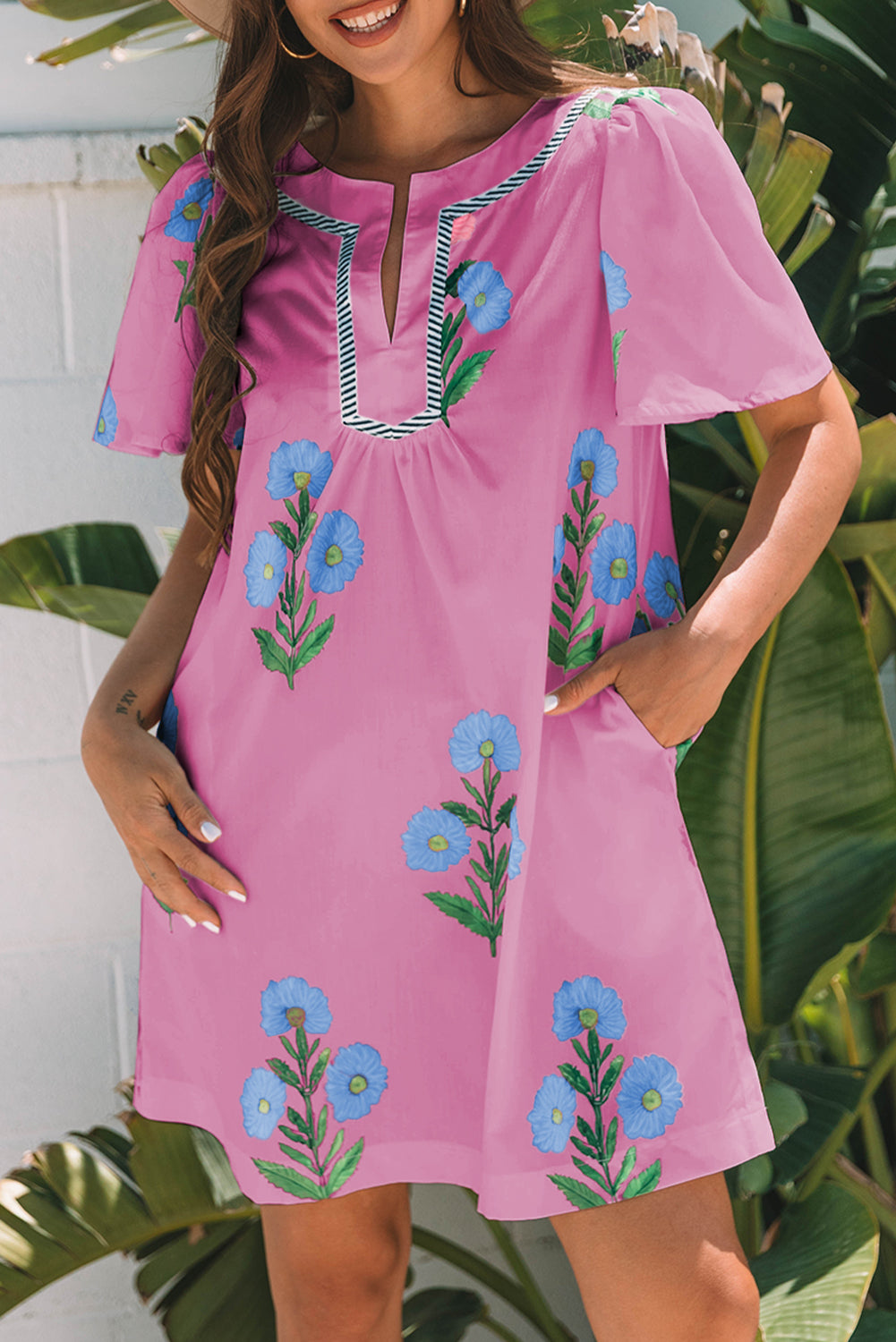 Blue floral short sleeve mini dress with split neck and loose fit, from Dear-Lover floral dresses collection.