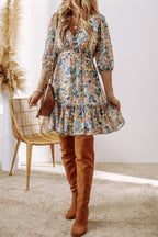 Sky blue floral dress with 3/4 sleeves, V-neck, high waist, and ruffled hem from Dear-Lover Dropshipping, perfect for spring or summer.