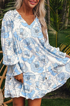Sky blue floral print tie neck long sleeve flowy mini dress by Dear-Lover, with a relaxed fit and elegant floral design.