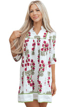 White floral dress with frilled V-neck, 3/4 sleeves, and a loose fit, made from lightweight cotton by Dear-Lover.