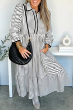 Black stripe maxi dress by Dear-Lover with scallop trim, shirt collar, half button, and 3/4 sleeves, made of polyester and viscose.