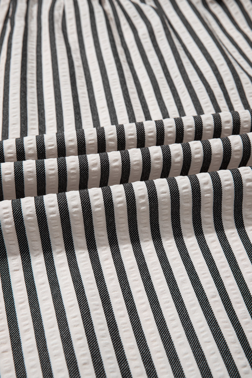 Black stripe maxi dress by Dear-Lover with scallop trim, shirt collar, half button, and 3/4 sleeves in a stylish, long design.