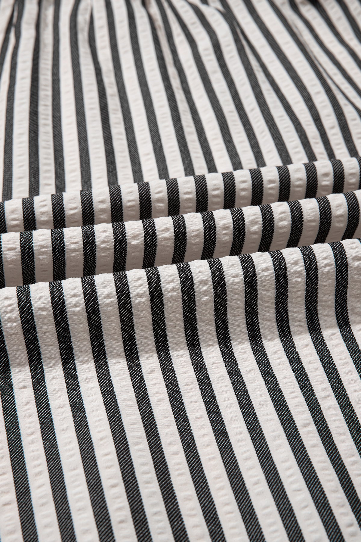 Black stripe maxi dress by Dear-Lover with scallop trim, shirt collar, half button, and 3/4 sleeves in a stylish, long design.