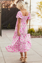 Pink floral maxi dress with smocked bodice and puff sleeves, flowy and elegant, by Dear-Lover Dropshipping.