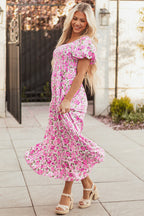 Pink dainty floral maxi dress with smocked bodice, puff sleeves, and flowy long skirt from Dear-Lover.