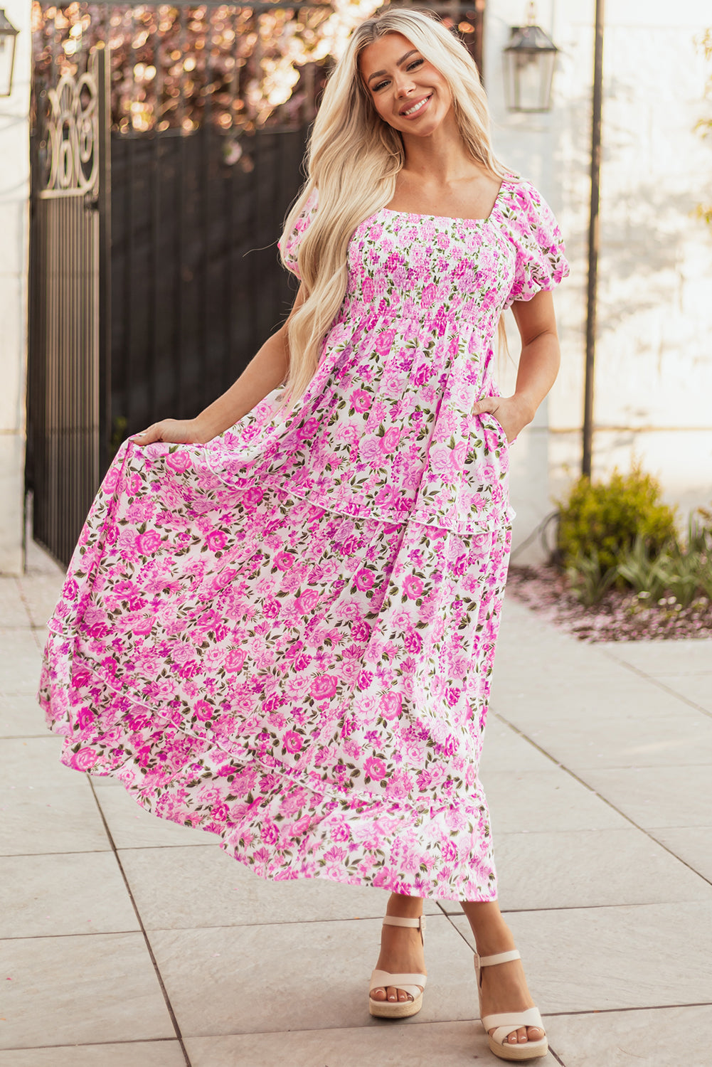 Pink floral maxi dress by Dear-Lover with smocked bodice, puff sleeves, and flowy long skirt in lightweight polyester.
