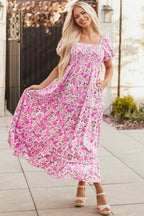 Pink floral maxi dress by Dear-Lover with smocked bodice, puff sleeves, and flowy long skirt in lightweight polyester.