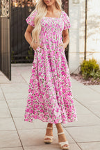 Pink floral maxi dress with smocked bodice and puff sleeves, flowy long dress by Dear-Lover for elegant summer wear.