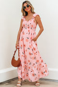 Pink floral maxi dress with V-neck, smocked waist, and ruffle hem, featuring long length and elegant design by Dear-Lover.