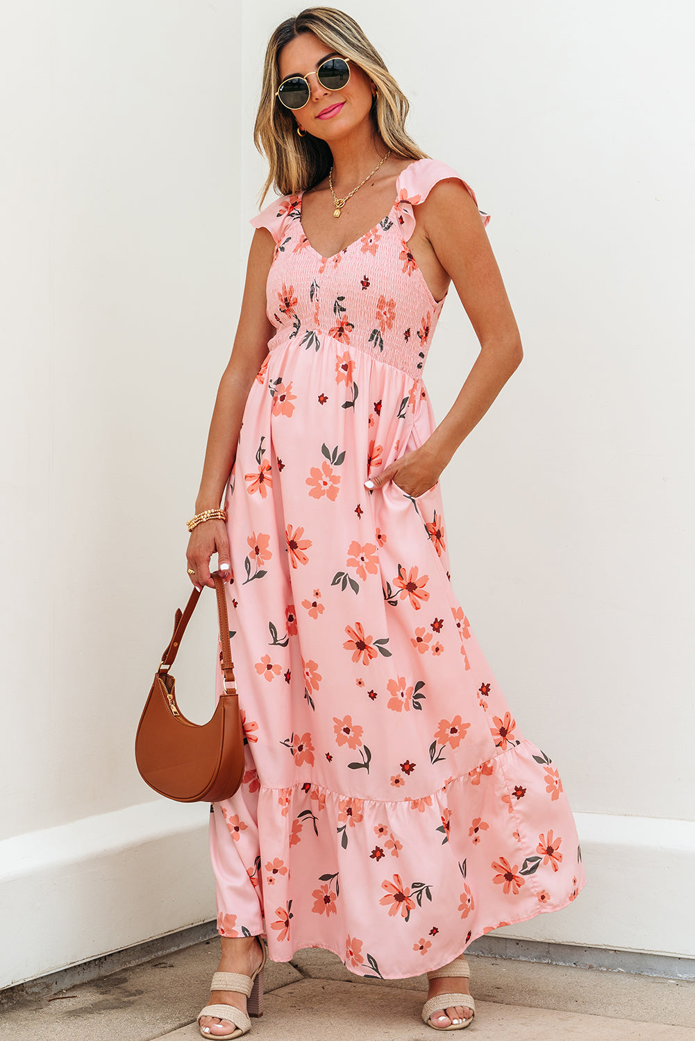 Pink floral maxi dress with V-neck, smocked waist, and ruffle hem, featuring long length and elegant design by Dear-Lover.