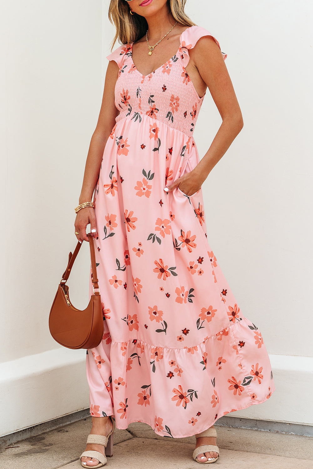Pink floral maxi dress by Dear-Lover with V-neck, smocked waist, ruffle hem, and long flowing design in polyester fabric.