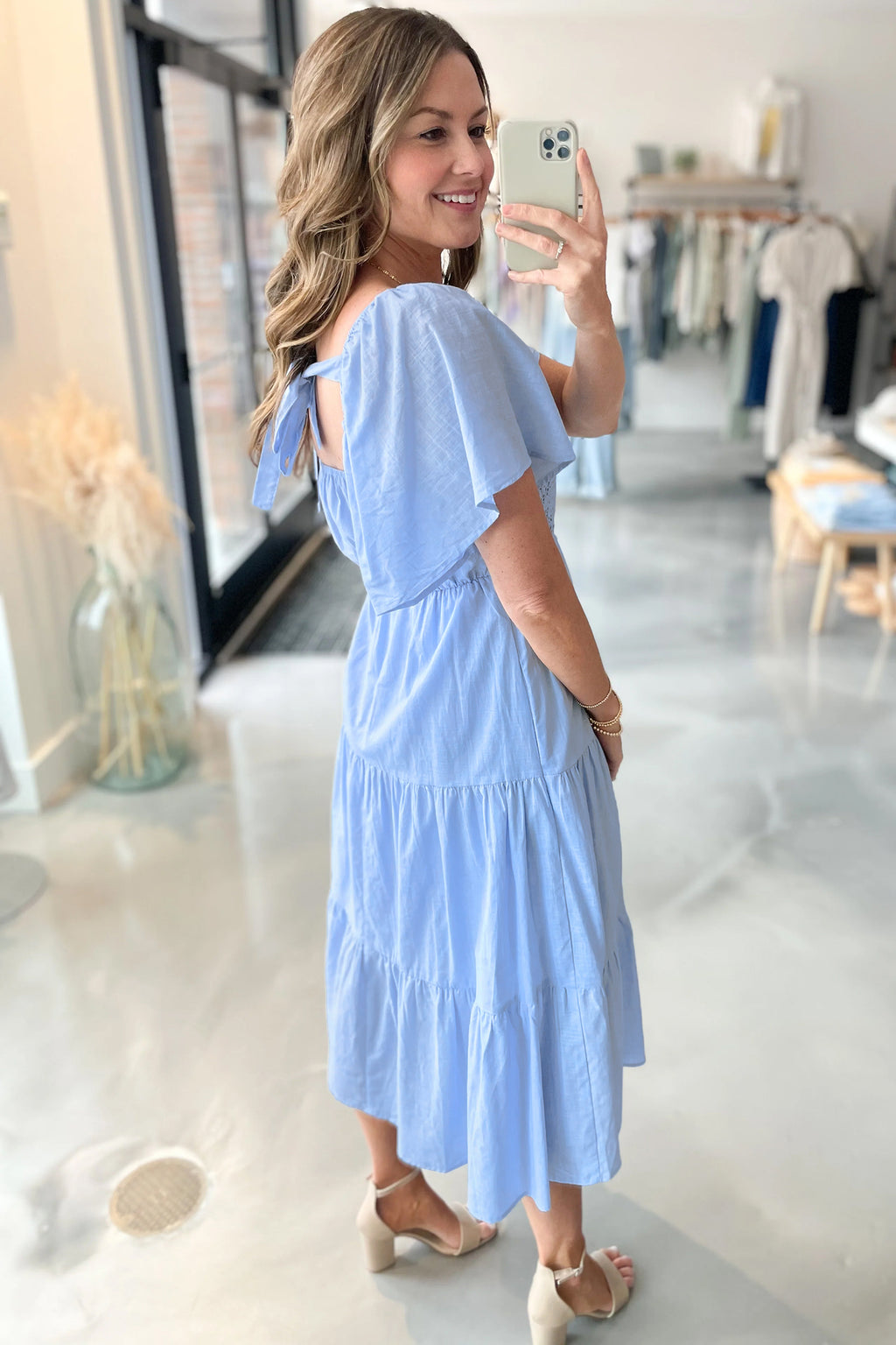 Beau Blue Flowy Short Sleeve Lace Detail Square Neck Tiered Midi Dress by Dear-Lover, showcasing its lightweight fabric and elegant design.