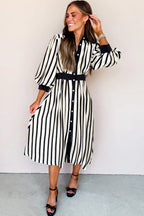 Black stripe midi dress with puff 3/4 sleeves, button-down style, made of viscose fabric, by Dear-Lover Dropshipping.