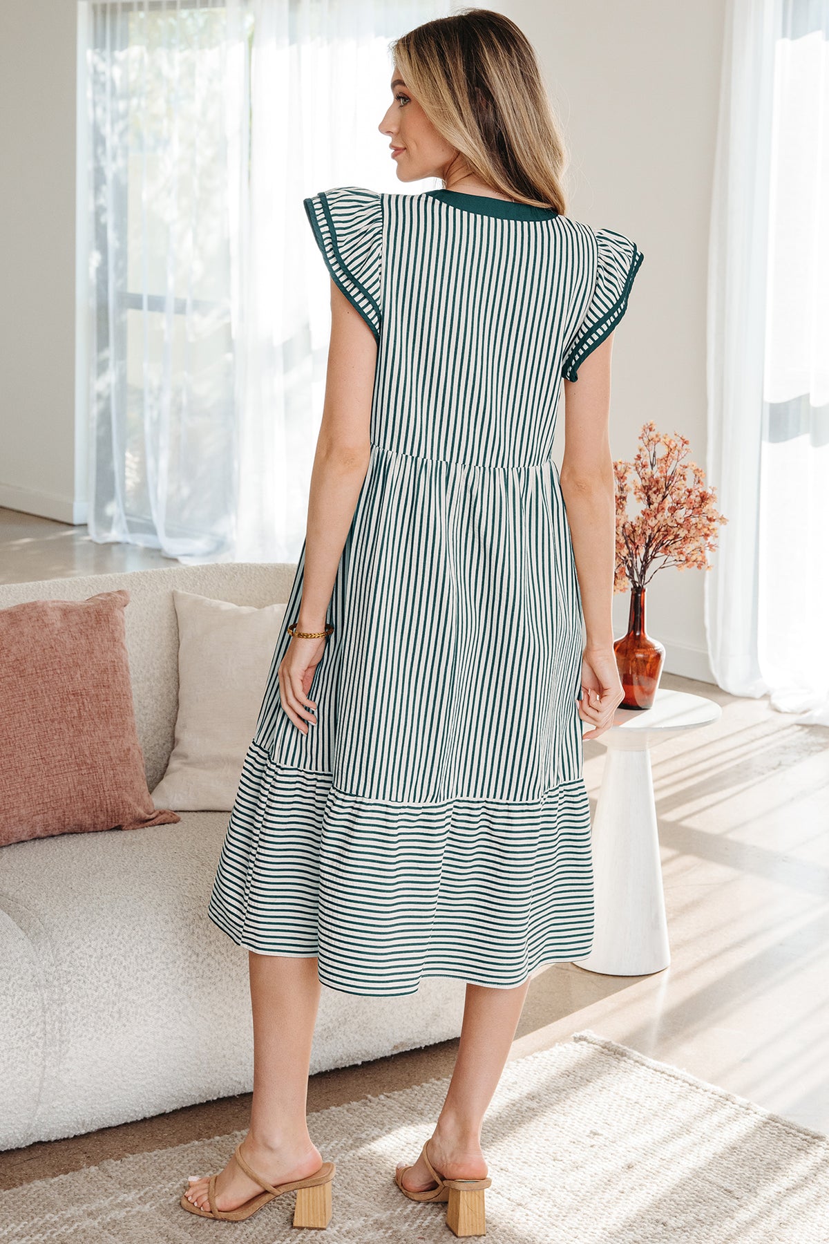 Green stripe midi dress by Dear-Lover with double ruffles, contrast trim, short sleeves, and V-neck design.