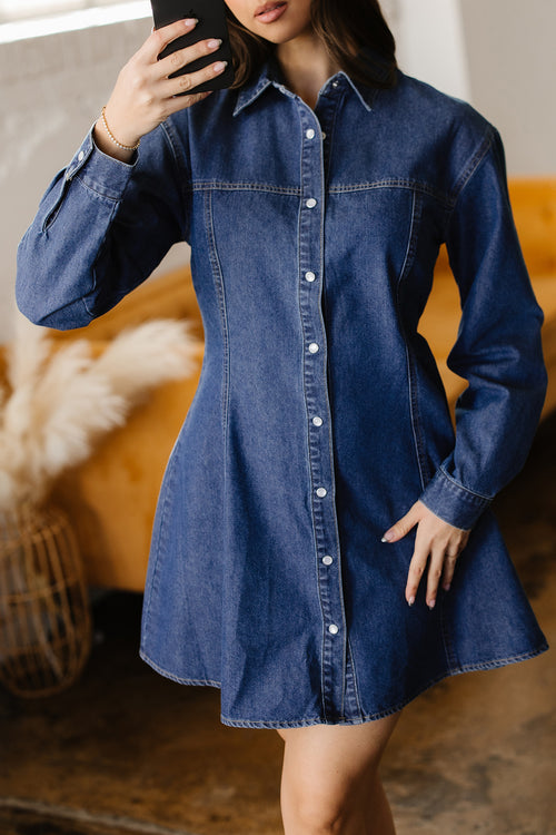 Ashleigh blue denim mini dress by Dear-Lover with shirt collar, long sleeves, flared skirt, made of cotton and polyester blend.