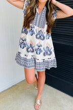 Blue boho Western floral printed mini dress with split neck and ruffled sleeves by Dear-Lover, made from viscose and polyamide fabric.