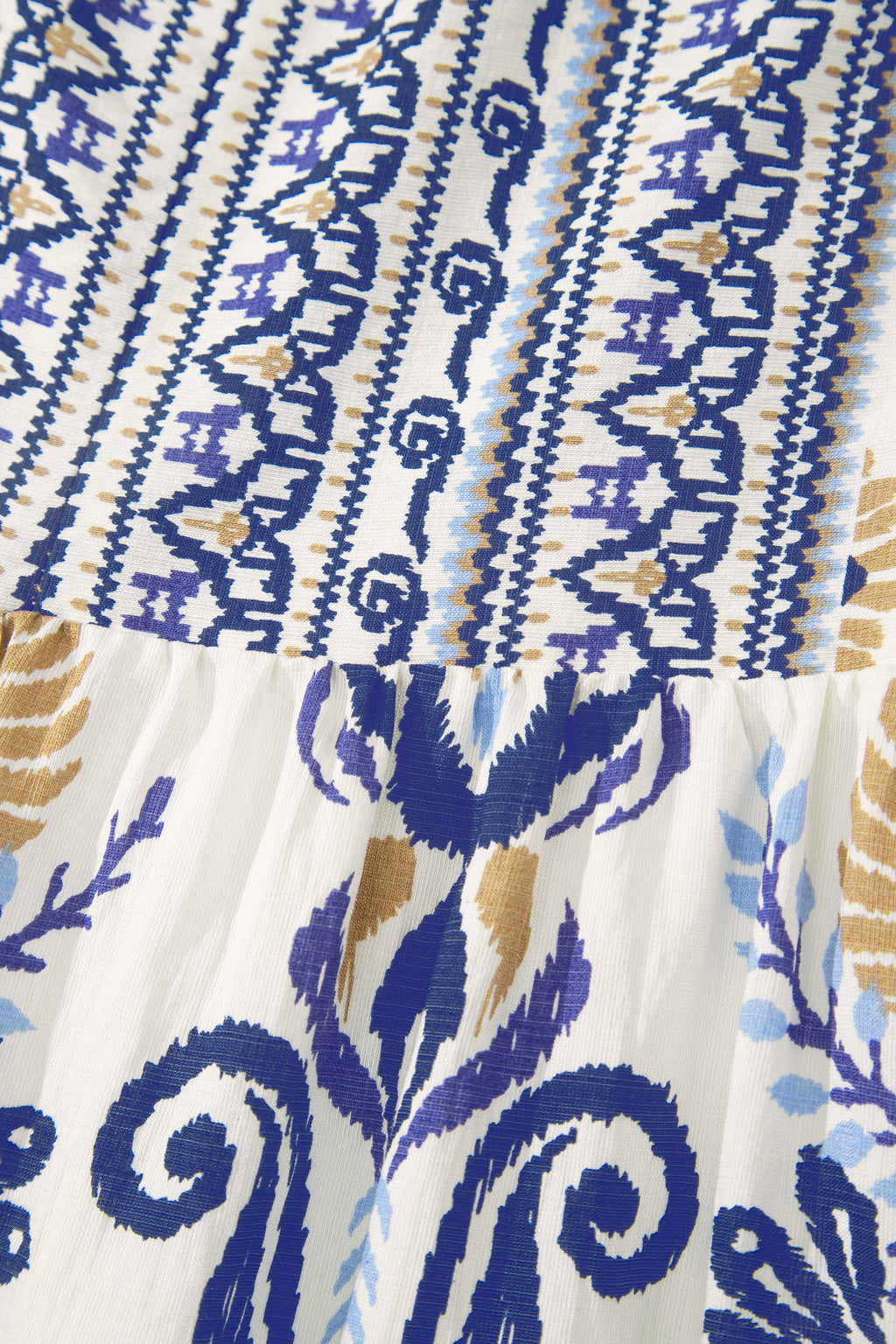 Blue boho Western floral printed mini dress with split neckline and ruffled sleeves by Dear-Lover. Viscose-polyamide blend.
