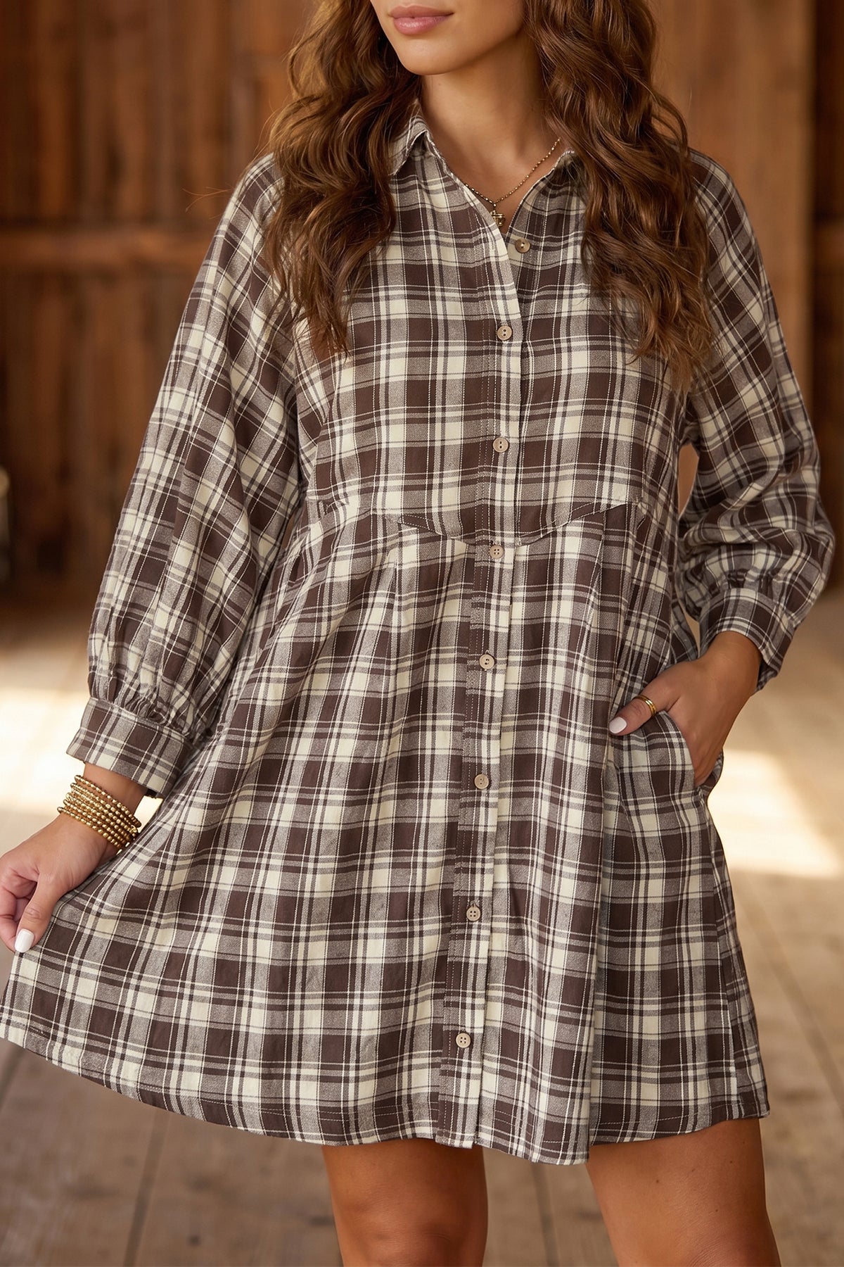 Brown plaid long sleeve mini dress from Dear-Lover, casual shift style with a short, relaxed fit and classic plaid pattern.