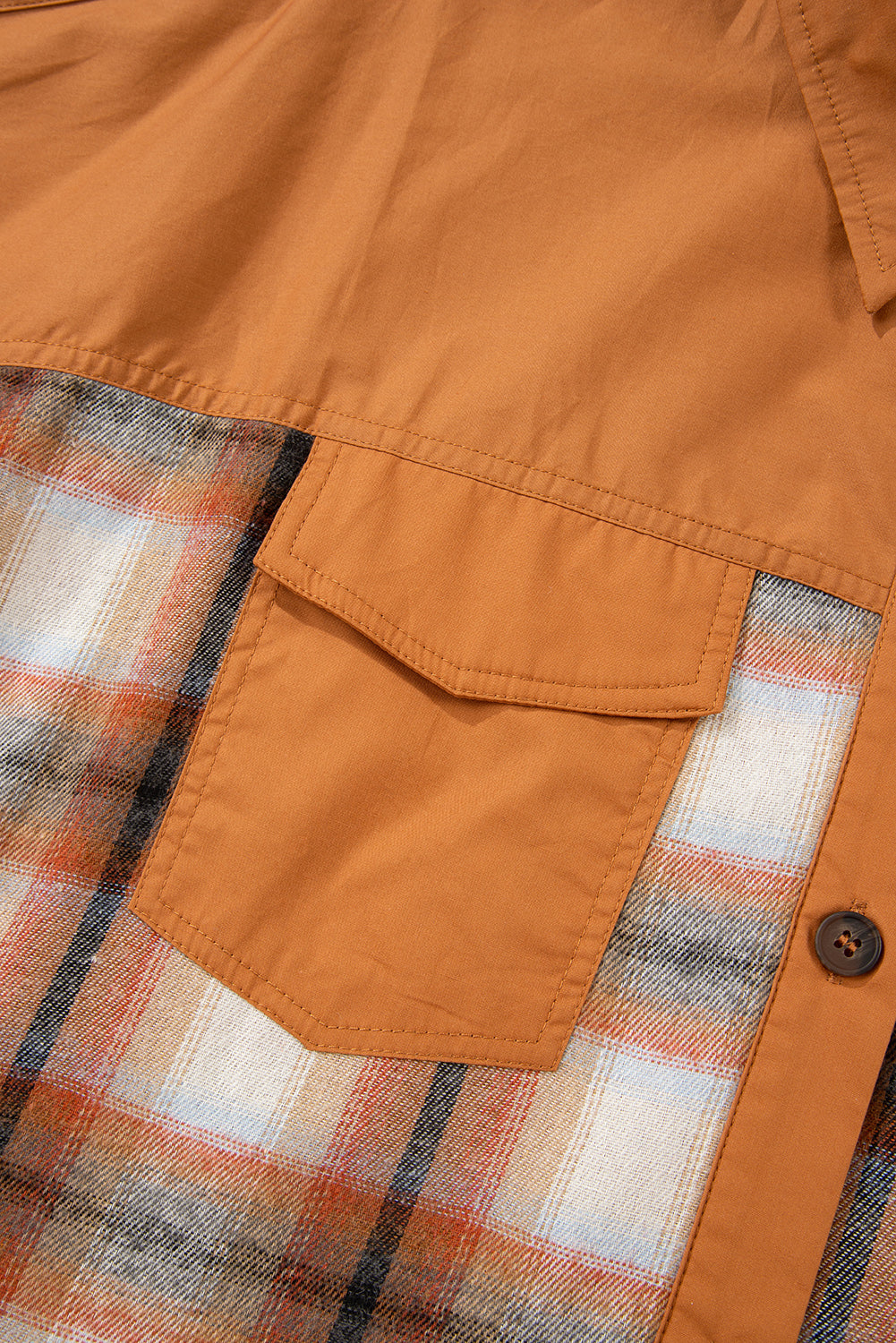 Khaki plaid patchwork tunic shirt dress with ruffle hem, short sleeves, and color block design, made of polyester and cotton.