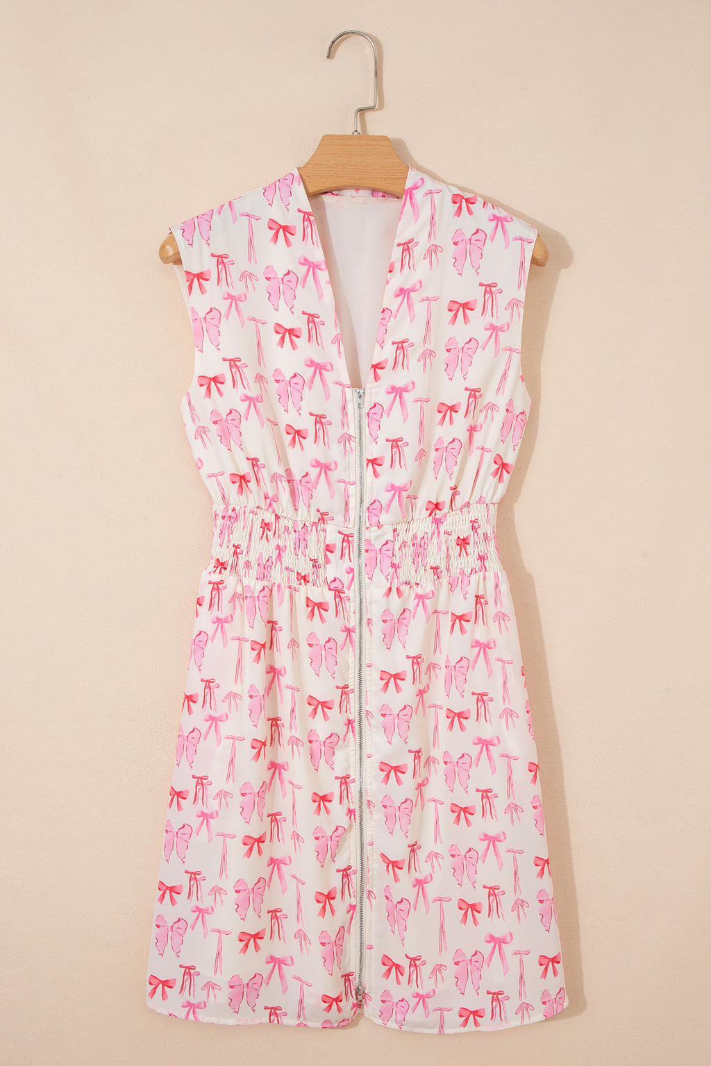 Pink sleeveless mini dress with zip front, cinched waist, and bow detail by Dear-Lover Dropshipping, perfect for casual wear