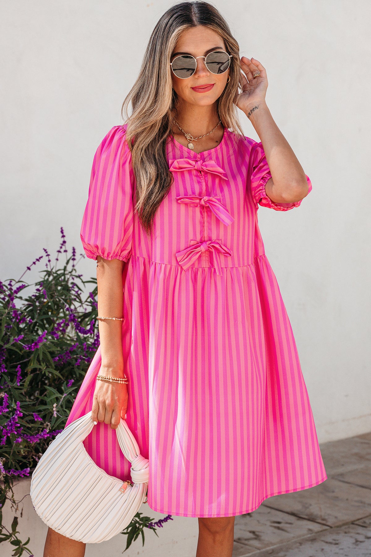 Rose striped print mini dress with bow detail and short puff sleeves, made from polyester, by Dear-Lover Dropshipping.