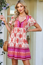 Rose boho floral mini dress by Dear-Lover with short sleeves, V-neck, lace-up front, made of viscose and polyamide fabric.