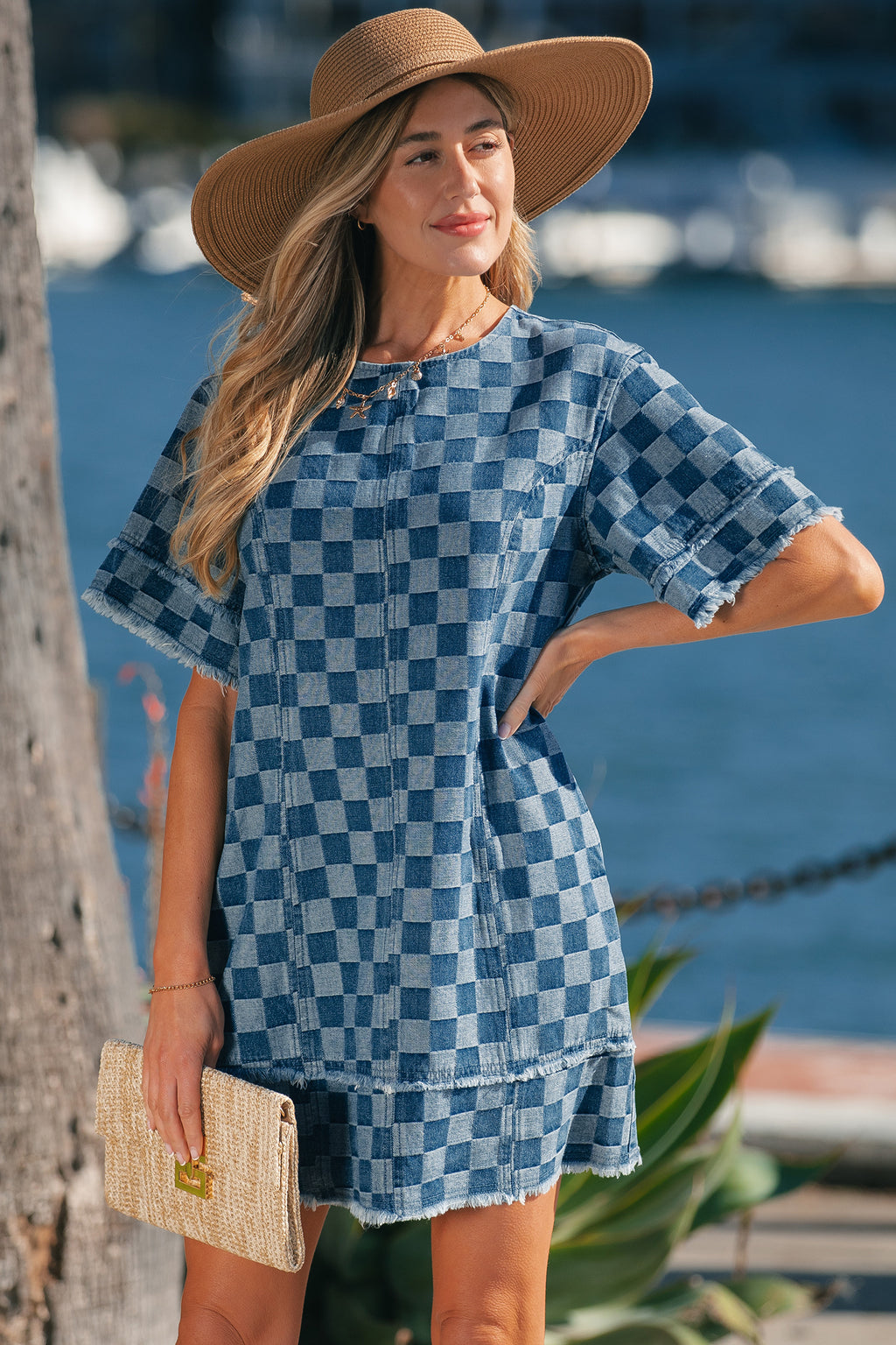 Sky blue checkered denim mini dress with frayed hem from Dear-Lover, featuring a casual sleeveless design and cotton-polyester fabric.